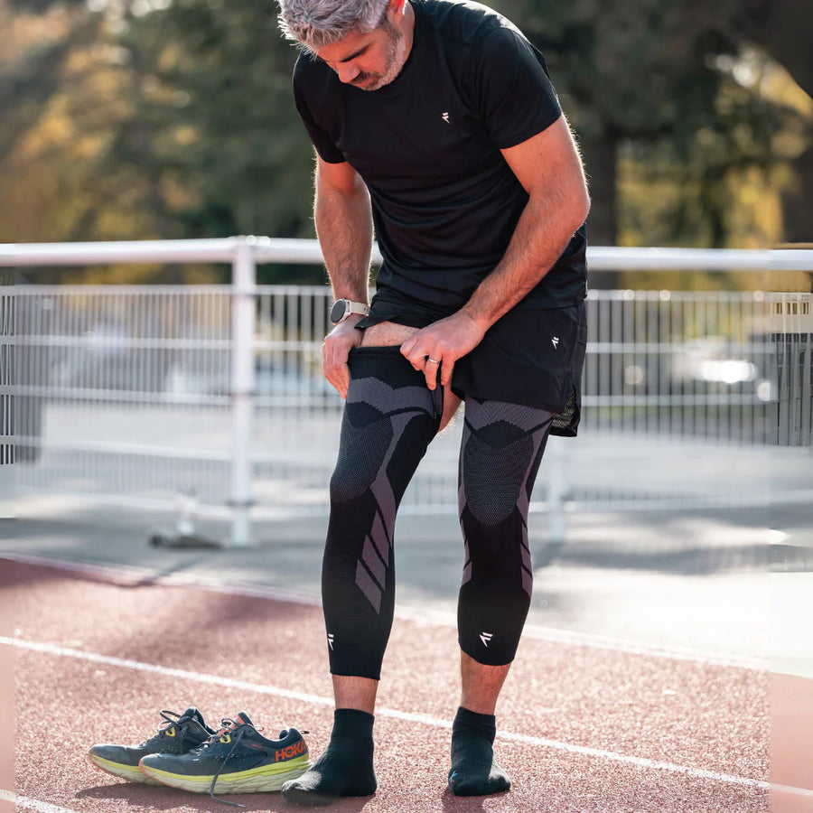 Flytex product photograph showing the knee-and-leg sleeve positioned on the leg